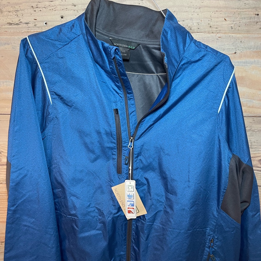 NWT North End blue rain jacket.